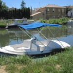 Electric boat for hire on the Canal du Midi at Villeneuve-les-Béziers